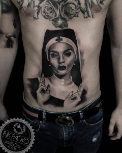 Tetování ve stylu realistic. Motiv lidé, portrét. Velká kérka. Tetoval Kuba Packo.