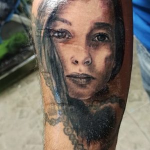 Tetování ve stylu realistic. Motiv portrét. Střední kérka.