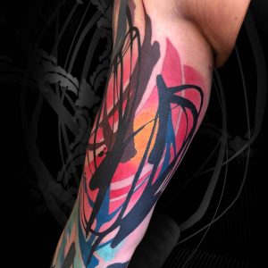 Tetování ve stylu watercolor. Motiv abstrakce. Střední kérka. Tetoval Tomáš Füllsack.