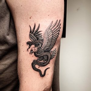 Tetování ve stylu blackwork. Motiv zvířata. Malá kérka. Tetoval David Korfant.
