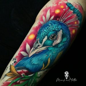 Tetování ve stylu watercolor. Motiv zvířata. Střední kérka. Tetovala Mirik Art.