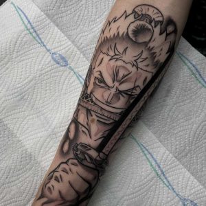 Tetování ve stylu blackwork. Motiv anime. Střední kérka. Tetoval Youngsoul.